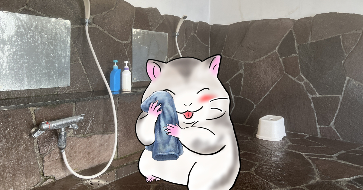 タオルで顔を拭くハムスター